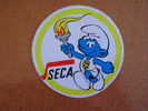 SCHTROUMPF SMURF Jeux Olympiques  Autocollant    Sticker  Pub SECA - Zelfklevers