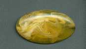 LARGE BROOCH MADE OF AMBER IMITATION - Broches