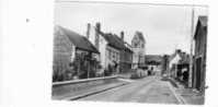 61 CPSM  CARTE PHOTO TRUN RUE DE LA HARDOUELLE 1962 - Trun