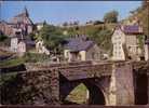 19 - TREIGNAC - Un Aperçu Sur Le Vieux Pont Et L´Eglise - Treignac