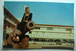 Curacao - Lovely Dutch Girl In Typical Costume Posing On Old Cannon On The Walls Of Historic Waterfort, - Curaçao