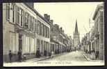 CPA  ANCIENNE- FRANCE- HONDSCHOOTE (59)- LA RUE DE L'OUEST AVEC BELLE ANIMATION- DRAPERIE "DECOOL-BAEY"- - Hondshoote