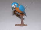 Figurine - Perroquet Bleu Corps Orange - Hauteur 6,5 Cm - Pájaros