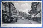 Apeldoorn,Deventerstraat, 1930-1940,Geschäfte,Oldtimer,Radfahrer,Passanten,Zeitdokument, - Apeldoorn