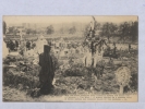 Marne - Esternay - Une Veuve Priant Sur Une Fosse Commune Dans Laquelle Repose... CPA . FRANCE . - Esternay