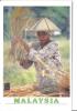 MALAYSIA  SABAHAN GIRL INTRADITIONAL ATTIRE THESHING RICE AT HARVEST TIME-G141-FG - Malesia