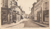 AAS 102/ CPA  REMALARD   (61) PERSPECTIVE DE LA RUE DE L'EGLISE VUE PRISE DE LA PLACE - Remalard