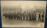 Revue Du 14 Juillet,LONGCHAMPS.Soldat S Annamites Et Drapeaux.Cpa,neuve,be,inf Ime Plissure - Flaggen