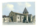 BUSSIERE POITEVINE  (87) - CPSM - L´église Romane Et Le Monument Aux Morts - Bussiere Poitevine