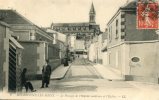 CPA 52 BOURBONNE LES BAINS LE PASSAGE DE L HOPITAL MILITAIRE ET L EGLISE 1912 - Bourbonne Les Bains