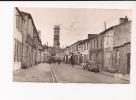 CPSM  ILE D´OLERON  , SAINT PIERRE D'OLERON  La Rue Principale Et L'église,sur Droite Coopérateurs - Saint-Pierre-d'Oleron