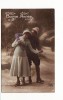 Carte 1910 BONNE ANNEE FEMME / HOMME / PATINS A GLACE / PATINAGE - Kunstschaatsen