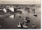 CPSM     29     GUILVINEC   1961      LECHIAGAT ET LE PORT   HOTEL DU PORT     BOULANGERIE BOUCHERIE STRUILLOU SUR MUR - Guilvinec