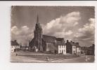 CPSM   GUERLESQUIN  L'église Et Quelques Maisons Sur Le Coté - Guerlesquin