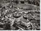 CPA     87        LE DORAT       LA COLLEGIALE   ET LES COUVENTS        VUE AERIENNE - Le Dorat