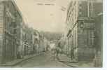 CPA 54- FOUG – Grande Rue (commerces, Café...) - Foug