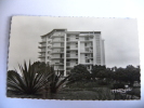 CPSM Congo - BRAZZAVILLE - Quartier De La Plaine - Le Building / Tampon Foire Exposition 1953 - Brazzaville