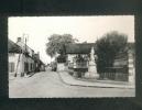 CPSM - Héry (89) - Grande Rue Et Monument Aux Morts ( Ets Henri Basuyau ) - Hery