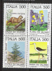Q859.-.ITALY .-. 1985 .- .  MNH .-. SCOTT # : 1634-37  .-.  BIRDS / AVES - FLOWERS / FLORES - Ooievaars