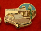 PIN´S PEUGEOT 205  - INDIANA CATUS HELLIUM - Peugeot