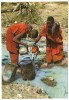 MASAI WOMEN COLLECTING WATER AT STREAM / WITH TANZANIA STAMP - Tansania