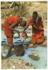 MASAI WOMEN COLLECTING WATER AT STREAM / WITH TANZANIA STAMP - Tanzanía