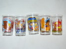 VERRES A MOUTARDE LOT DE 5 ( 1 NOUNOURS  / 1  SPIROU / 1 SAMS / 1 CHEVALIERS DU ZODIAQUE  ) FABRICANT  AMORA / NUTELLA - Glazen