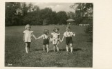 Four Small Children Taking A Walk At The Countryside Of A Mansion - Silhouettes