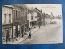 CPA....LILLIERS..LA PLACE DE LA MAIRIE..LIBRAIREIE  PATISSERIE...1917 - Lillers