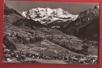 Q0117 Reichenbach Und Scharnachtal Mit Blümlisalp. Cachet 1955. Lörtscher 55. Petites Traces De Colle Au Dos. - Reichenbach Im Kandertal