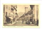 74 // LA ROCHE SUR FORON  La Rue Perrine ,  Animée Avec Auto Et Commerce . Edit . Braun . N°12921 . - La Roche-sur-Foron