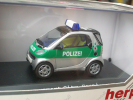 HERPA - SMART POLIZEI   AVEC SA  BOITE  Scala 1/43 - Herpa