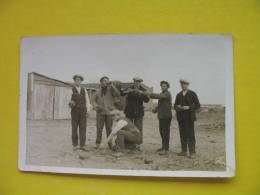 MEN DRINKING AND PLAY BOWLS - Petanque