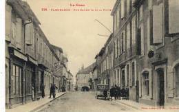 CPA (32)  FLEURANCE   Rue Gambetta Et La Poste - Fleurance