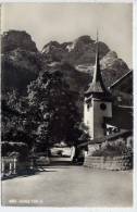Suisse---GSTEIG 1192m--env 1950-55--Eglise (belle Voiture) ,cpsm 9 X 14 éd Sartori--cachet  "Col Du Pillon " Au Verso - Gsteig Bei Gstaad