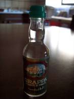 Grappa Tombolini: Bottiglia Mignon Tappo Plastica. Distillerie Tombolini Stabilimento Loreto - Licor Espirituoso