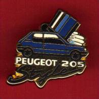 24816--pin's-peugeot 205 Style.signé Helium Paris. - Peugeot