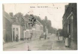 CP GUINES  RUE DE LA GARE - ECRITE EN 1910 - Guines