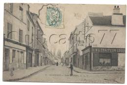 Gonesse (95) : Enfant Jouant Au Cerceau Devant Le Magasin De Vin Traiteur Logeur Dans La Rue De Paris En 1910 (animé). - Gonesse