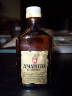 Amaretto Di Saronno: Bottiglia Mignon Tappo Plastica. ILLVA Stabilimento Di Caronno. - Spirits