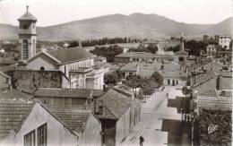 CPSM SOUK AHRAS (Algérie) - Vue Sur L'église Et La Mosquée - Souk Ahras