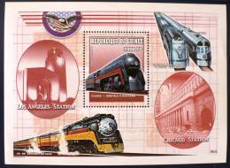 GUINEE Republique: TRAINS. Bloc Feuillet Histoire Des  Locomotives Et Des Gares Americaines. (los Angeles) Emis En 2000. - Treinen