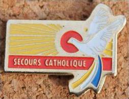 SECOURS CATHOLIQUE - COLOMBE - SOLEIL  -      (ROUGE) - Associations