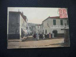 Cpa Algérie.Phillippeville.Une Rue Du Quartier.Grand Café Maure - Otros & Sin Clasificación