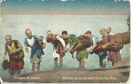 GROUPE DE SAKAS. NATIVES CARRYING WATER FROM THE NILE. - Persons