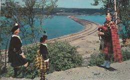 The Road To The Isles Causeway - Bagpiper Overlooking Canso Causeway - Cape Breton