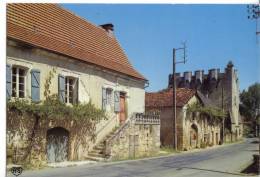 RUDELLE. - Rue Principale, Ancien Château Et Eglise Fortifiée. CPM - Sonstige & Ohne Zuordnung