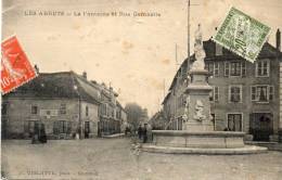 CPA- LES ABRETS(38) - La Fontaine - La Rue Gambetta - Hôtel Les Voyageurs - Les Abrets