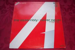 THE ASSEMBLY  °  NEVER NEVER - 45 T - Maxi-Single