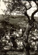 CPSM  OLLIERGUES   Un Coin Du Village  Et Ses Environs Vu Du Ciel - Olliergues